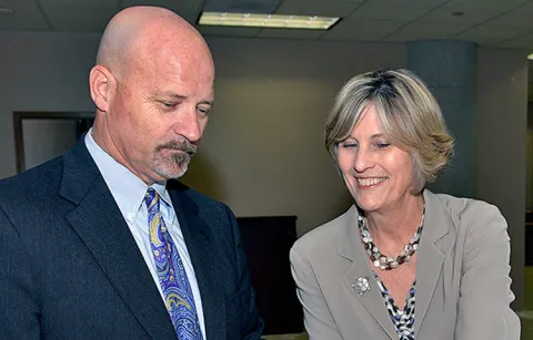 Steven Larimore, clerk of the U.S. District Court for the Southern District of Florida, and Katherine Gould Feldman, clerk of the U.S. Bankruptcy Court for the Southern District of Florida